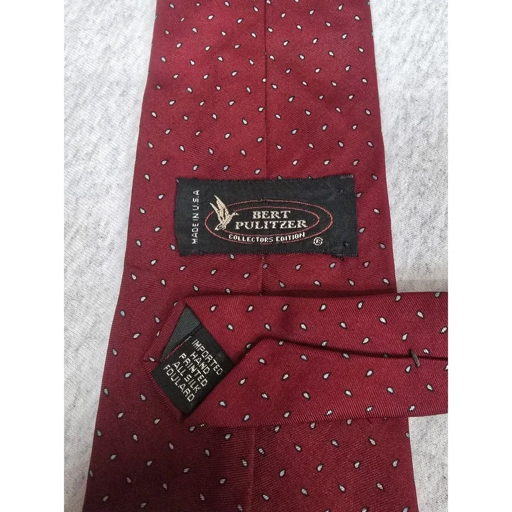 Bert Pulitzer Collectors Edition silk necktie featuring a red foulard pattern...